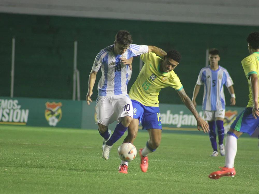 Photo of football players on a pitch during an Argentina vs Brazil match