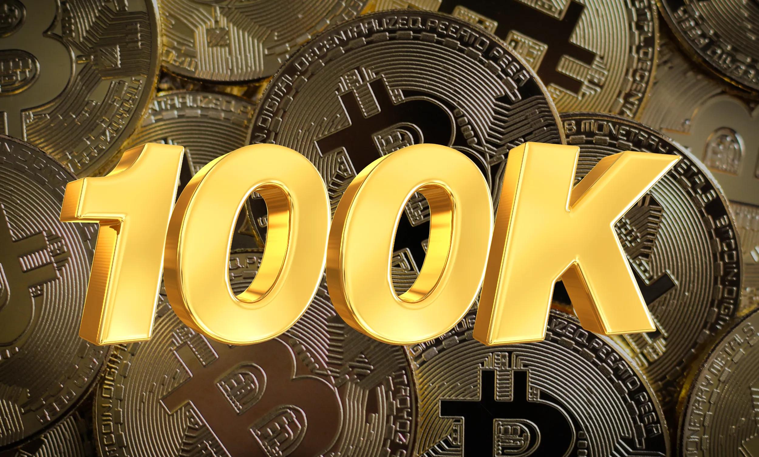 Bitcoins in background with 100K in gold letters in foreground