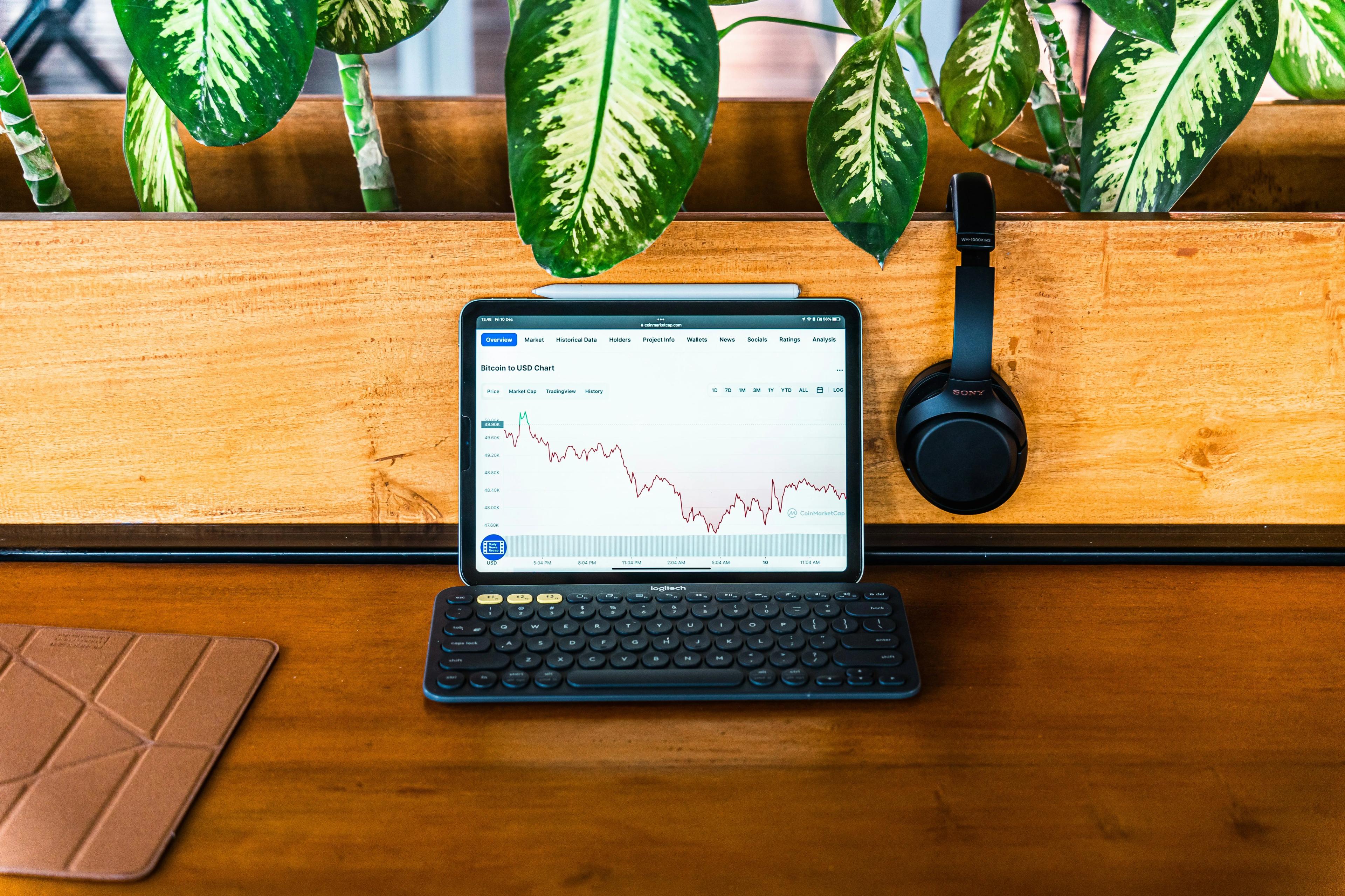 Laptop shows crypto price charts