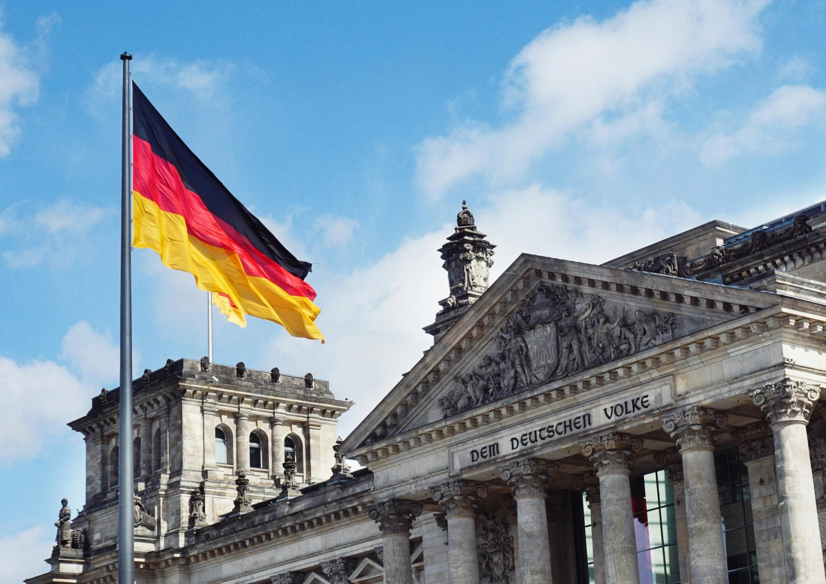 German flag in front of institutional building