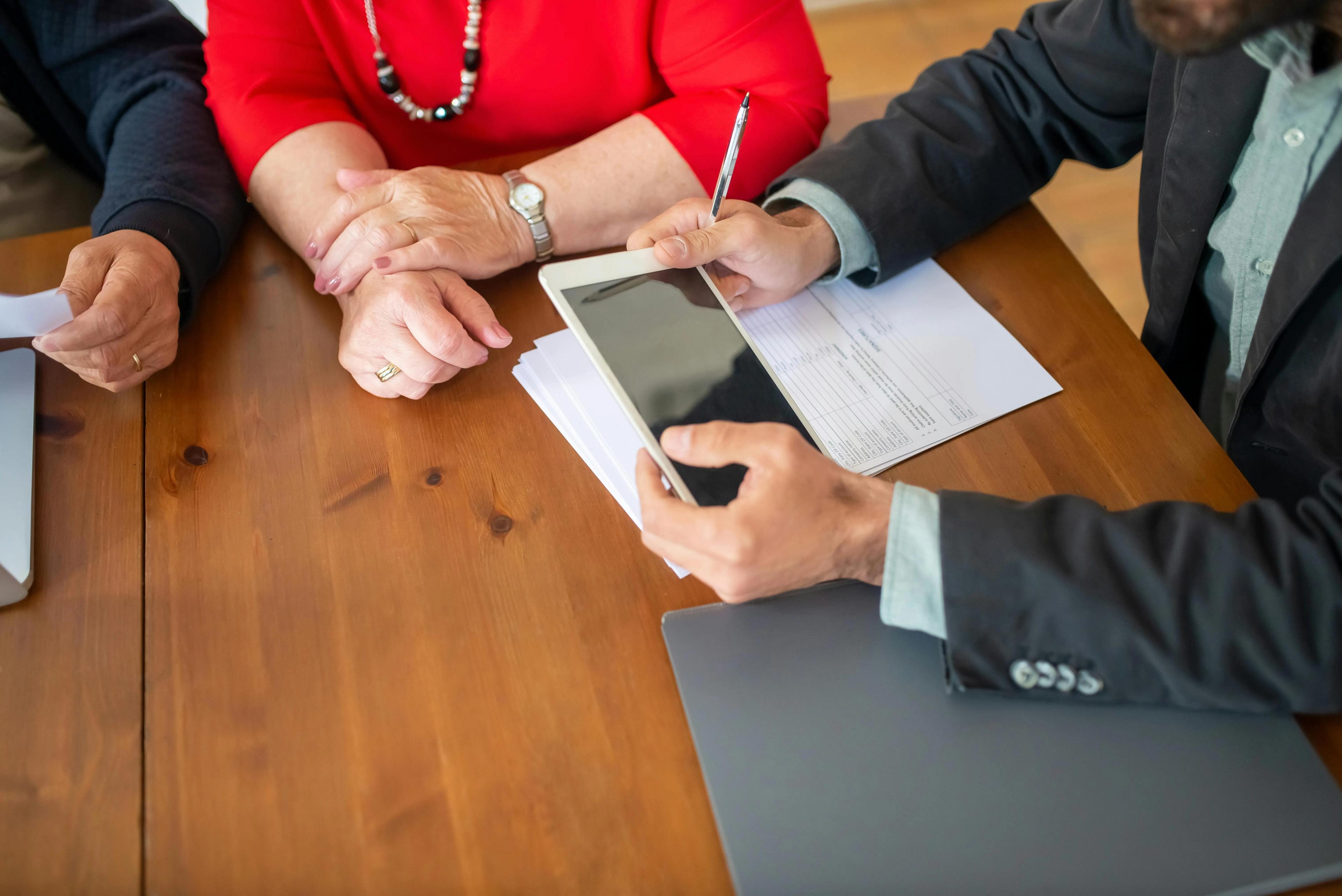 People working around a desk