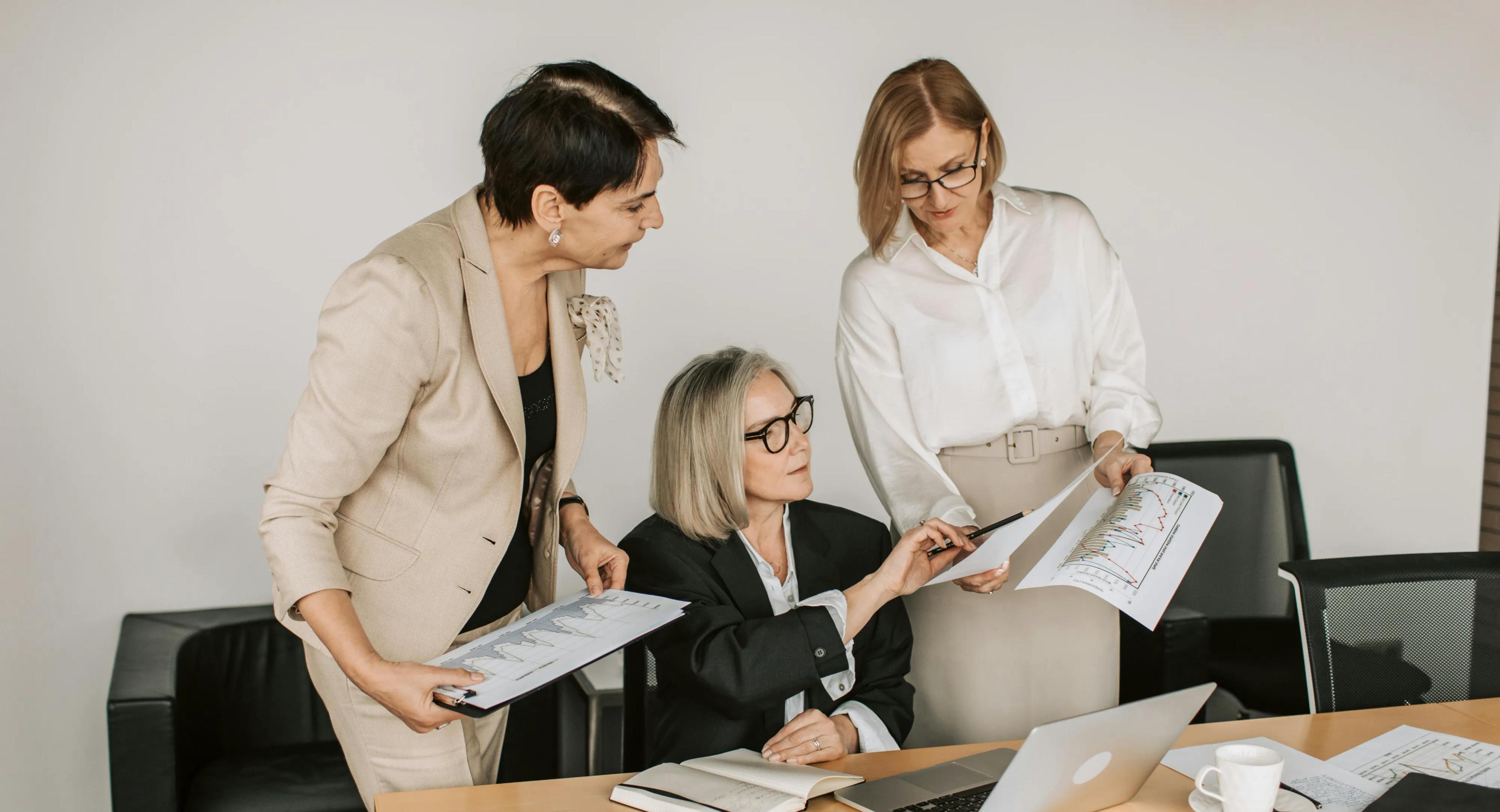 Women working together at a desk