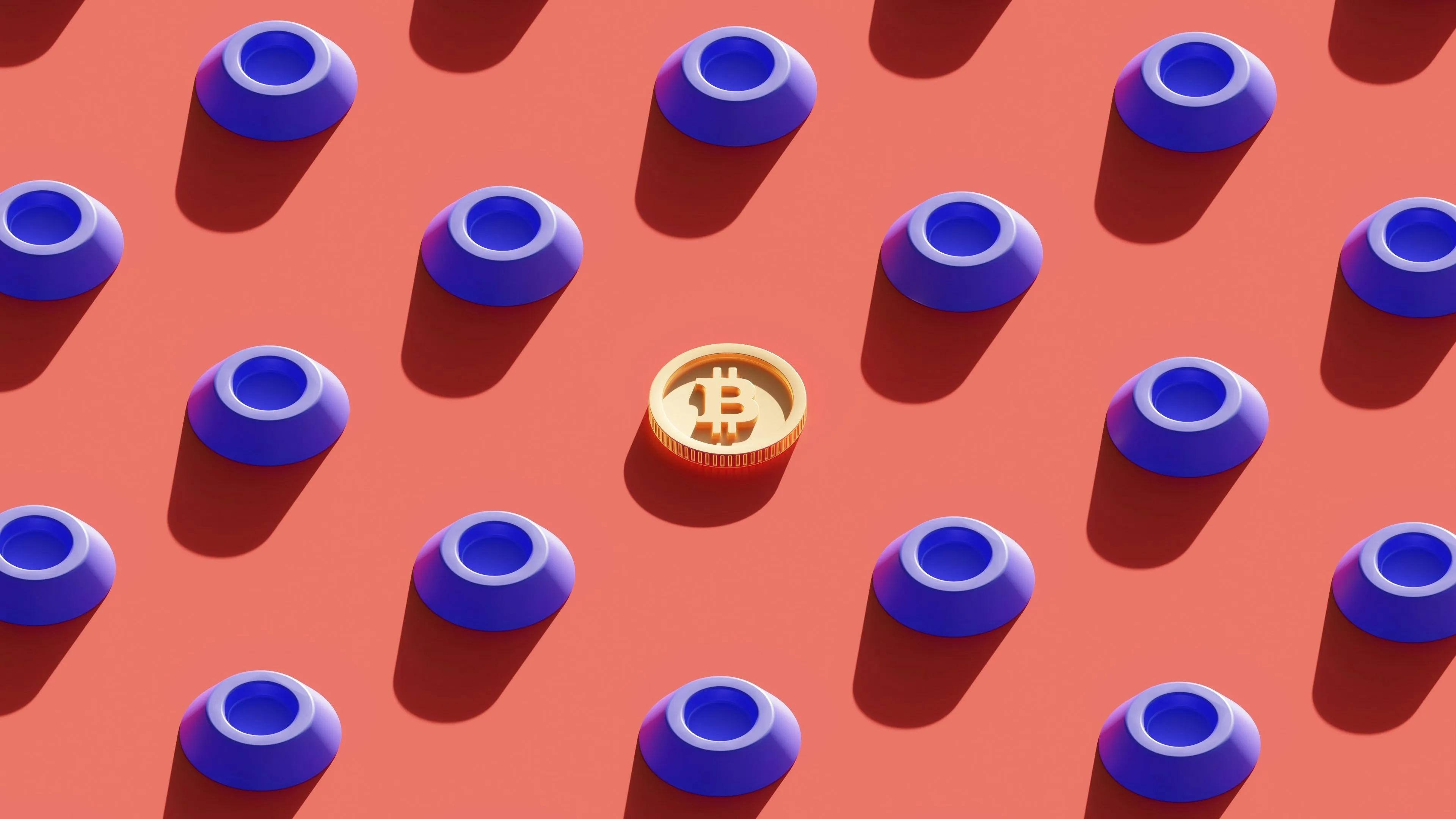 One Bitcoin on a pink background surrounded by other random objects